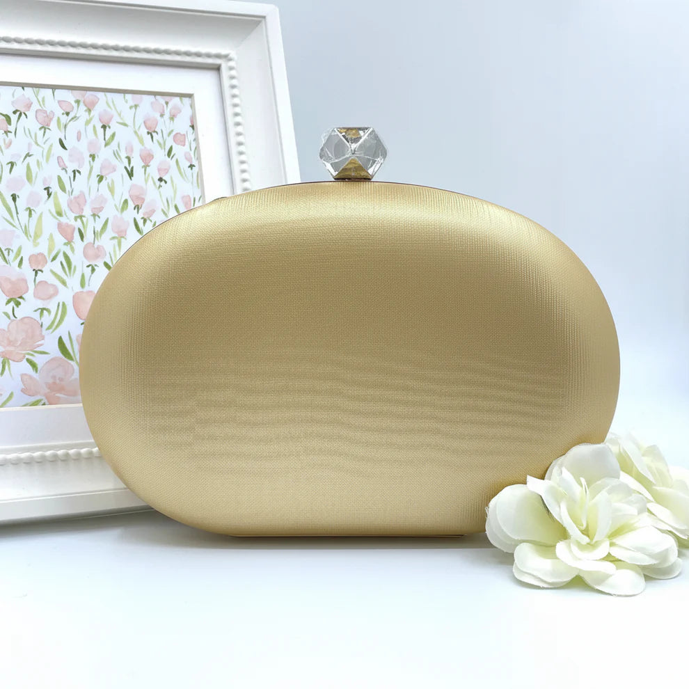 Gold Oval Clutch With Gold Frame