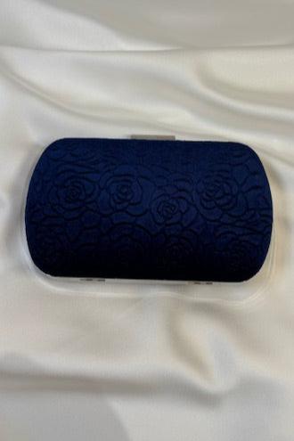 Royal blue velvet clutch with floral jacquard pattern