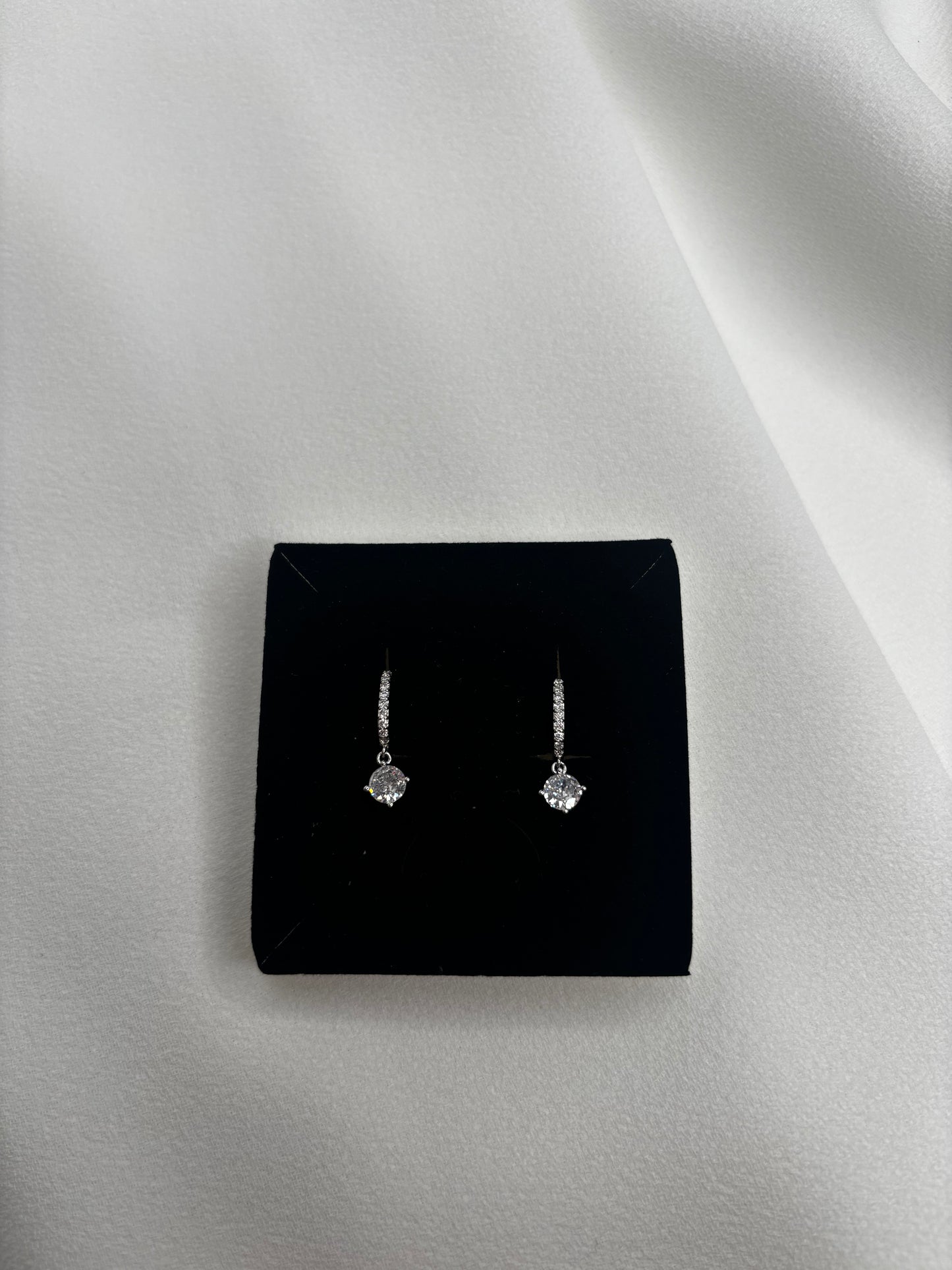 Diamond Huggie Earrings In Gold & Silver